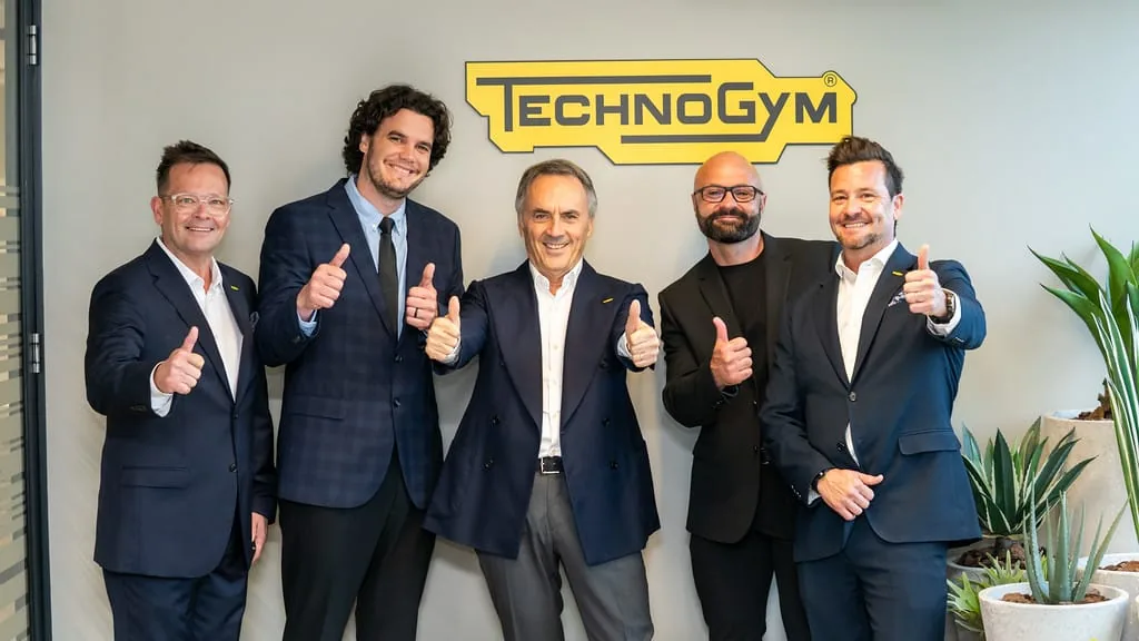 Itensity and Technogym MyWellness partnership team